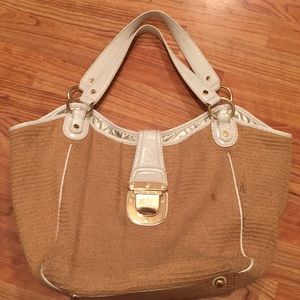 Tan and white Michaels Kors purse